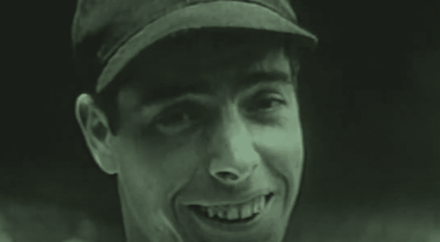 Iconic image of Joe DiMaggio, a key figure in Yankees' legendary history.